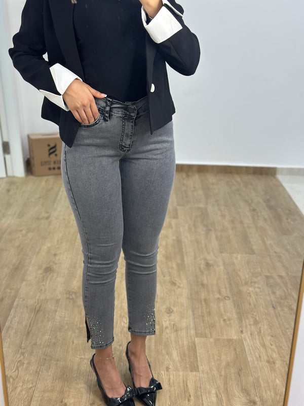 Skinny jeans مع فتحة وستراس